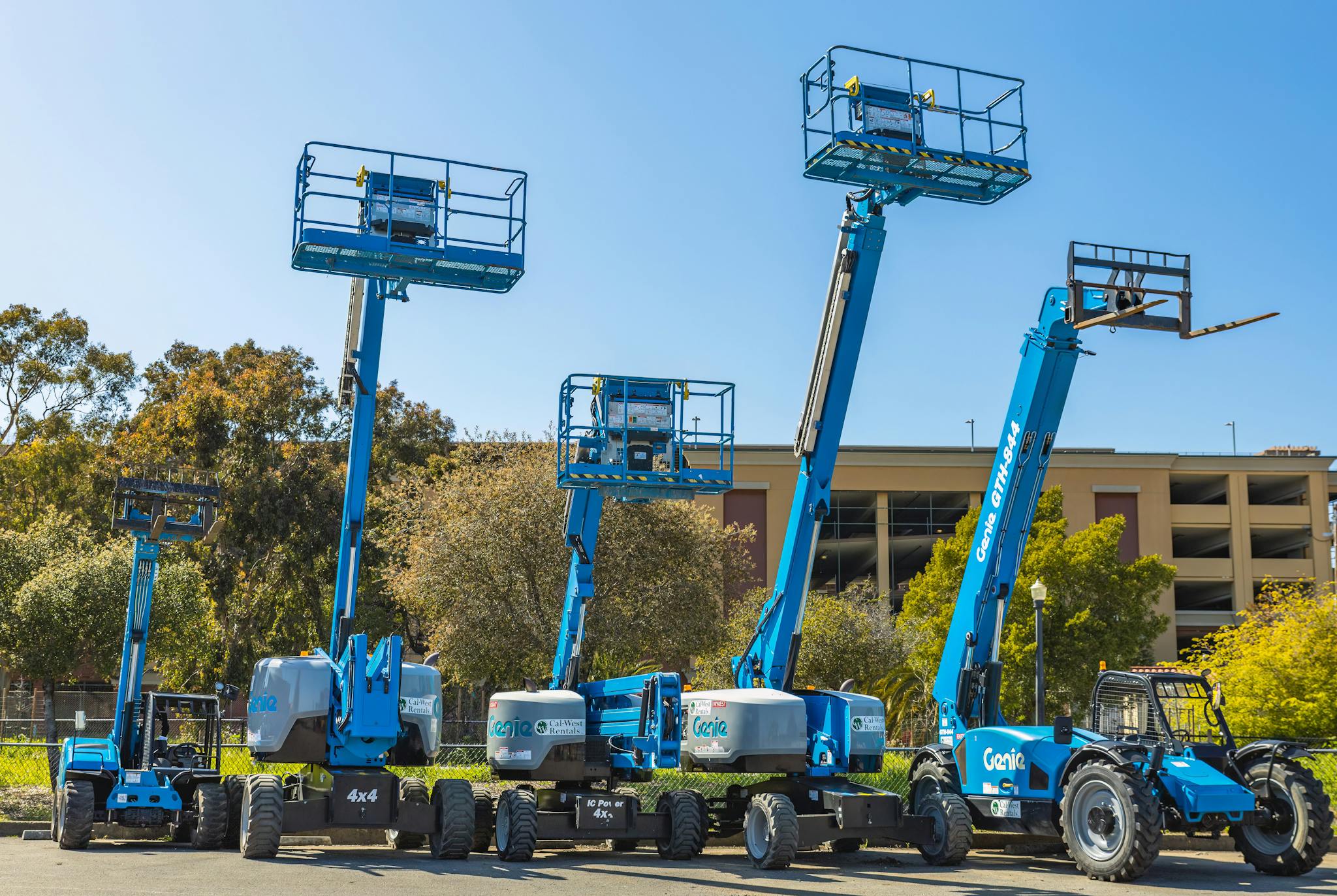 Blue Aerial Lift and Forklift Trucks