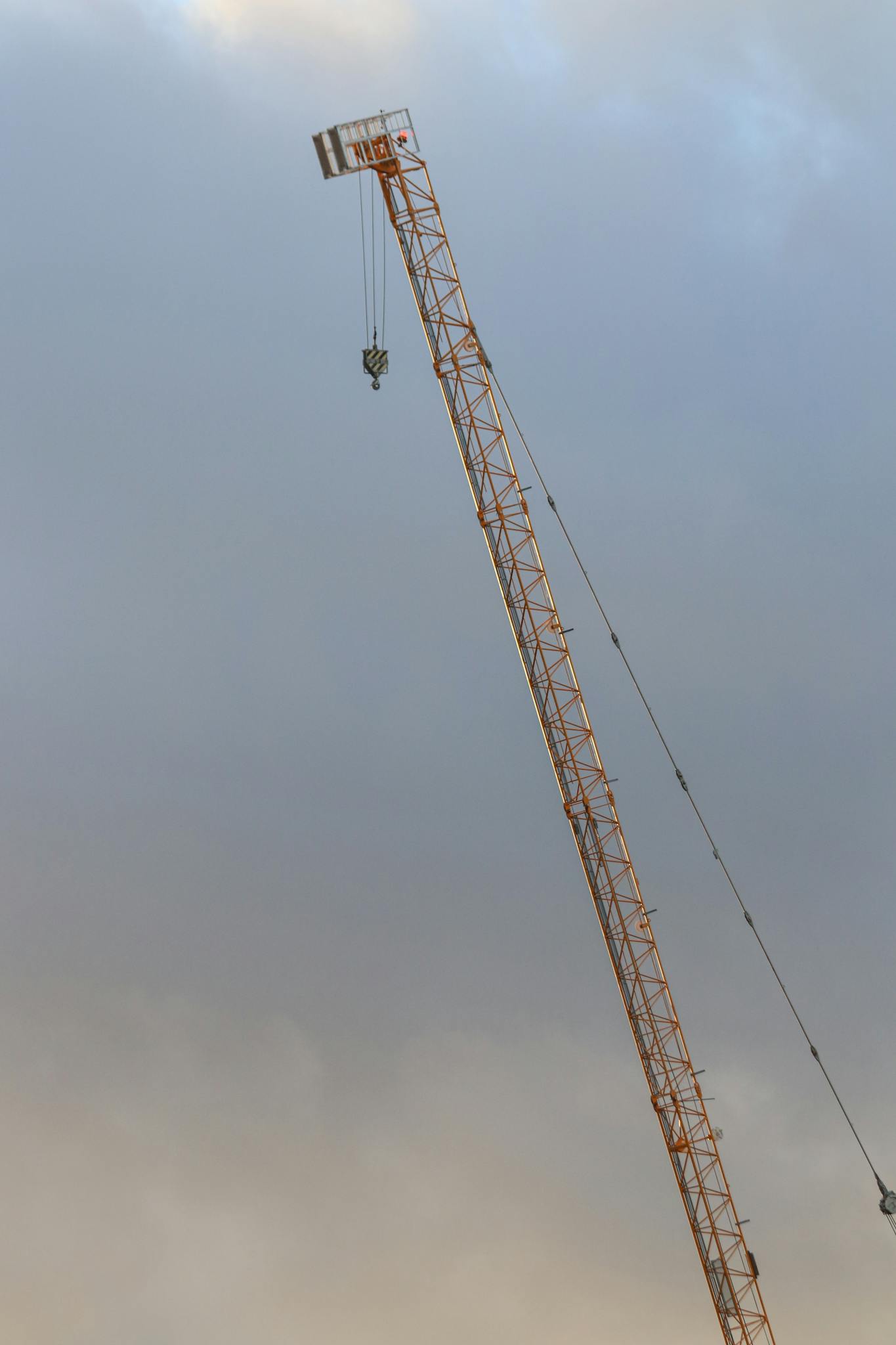 Crane Against Cloudy Sky